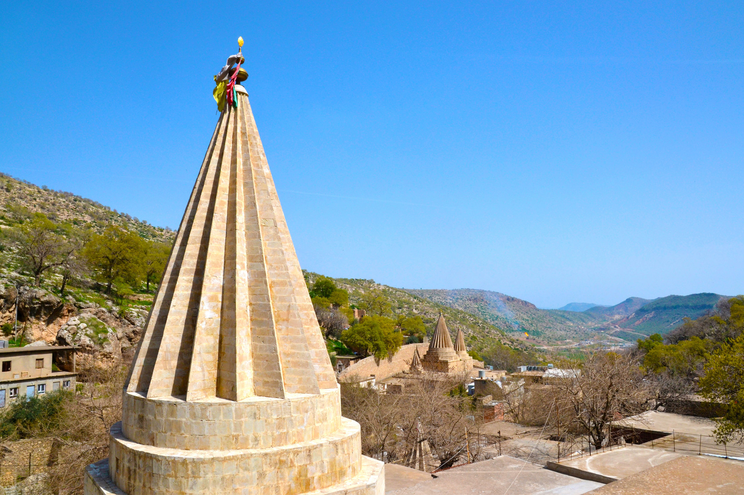 Lalish is an important Yazid holy site in Iraqi Kurdistan. A pile of knots made of colored fabrics, a knot means a closed wish.